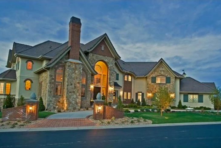 Peyton Manning House in Denver, showcasing its luxurious design and beautiful surroundings.